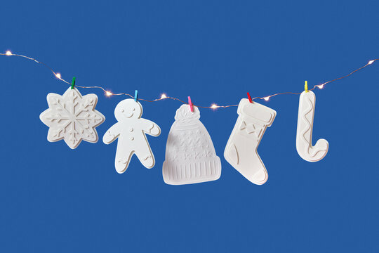 Paper Christmas decoration on garland.