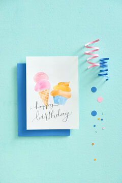 Minimal styled greeting card flatlay in pastel colors.