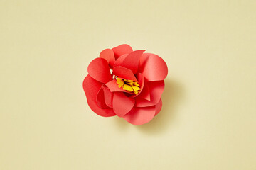 Red rose flower handmade from paper.