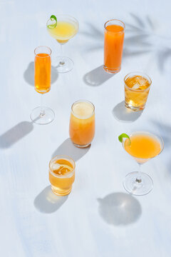 Freshly squeezed fruit juice in many various shape glasses