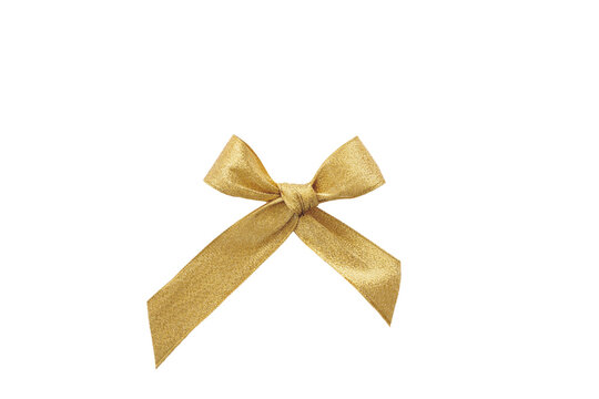 Golden satin ribbon bow isolated cutout on white background