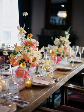 Dishware and decorations on banquet table