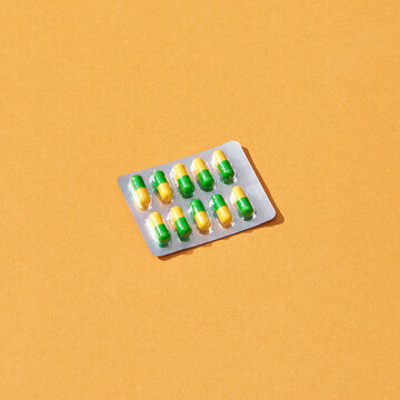 Close-up antibiotic capsule pills in blister pack.