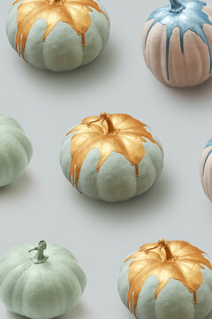 Golden painted natural pumpkins.