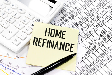 Business plan concept. Text HOME REFINANCE on stickers. Calculator, pen, charts, documents and graphs.