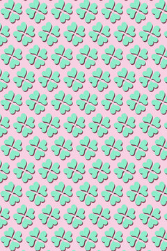 Handcraft paper clover's background with shadows.