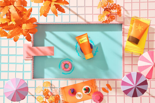 Skin product on swimming pool edge |√¢¬Ä¬åBeach oil and sun protection