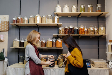 Seller offering buyer product for trial in organic shop