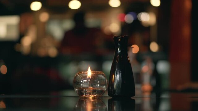 Candle on table in a restaurant