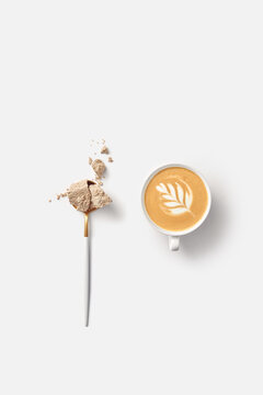 Coffee cup with sweet dessert.