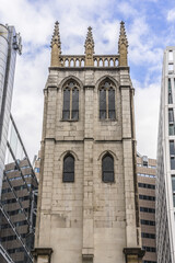 Fototapeta na wymiar Saint Alban Church Tower in Wood Street, City of London. St Alban was a church dedicated to Saint Alban. It was severely damaged by bombing during Second World War - ruins cleared, leaving only tower.