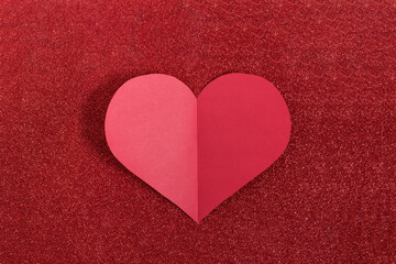 Obraz premium Valentines day background with hearts top view on red.