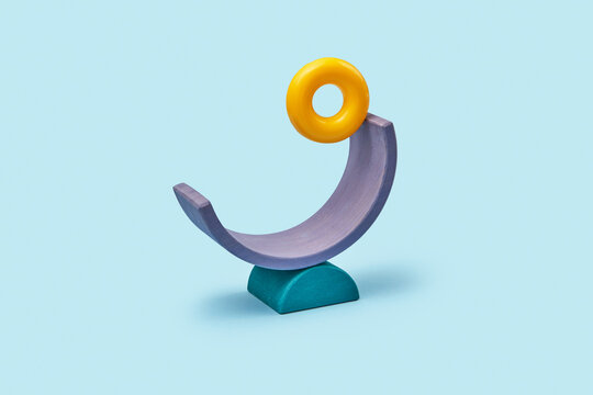 Balance from wooden and plastic figures.
