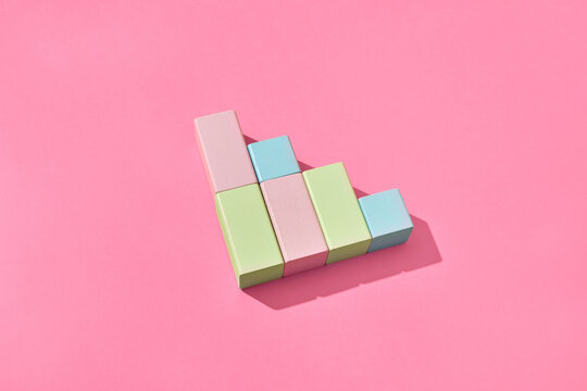 Composition from wooden cubes and blocks.