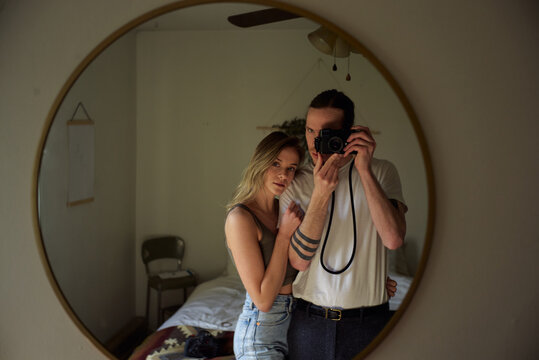 Couple photo through mirror