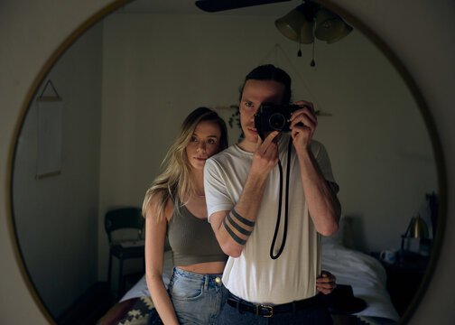 Couple photo through mirror