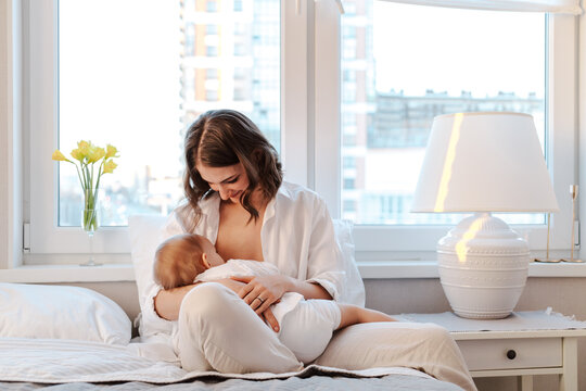 Mother breastfeeding baby