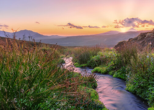 Landscape with mountain river before Mutnovsky volcano, Kamchatka Peninsula.