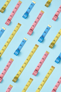 Vertical pattern from measuring tapes.