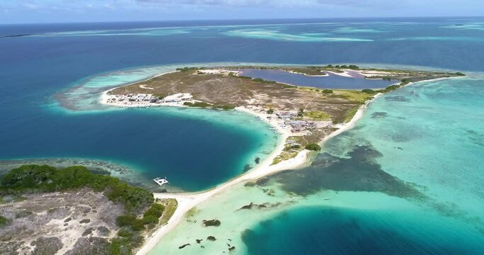 Aerial view, forward descending movement.  pirate island. Los roques Venezuela