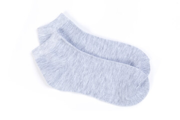 Pair of light gray short socks on a white background, top view
