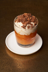 Persimmon smoothie with yoghurt cream and chocolate