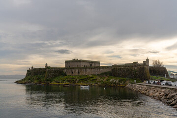 view of the Castelo de San Anton fortress in the harbor of La Coruna in Galicia