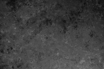 Gray stone background with splashes of black