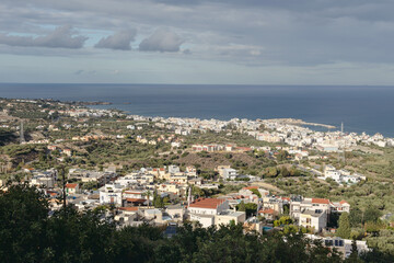 Fototapeta na wymiar Panoramic, picturesque view of the city resort Hersonissos (Greece, island Crete)