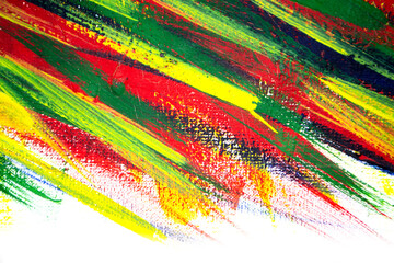 Background from different strokes of red, yellow, green and blue paint