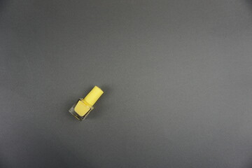Nail polish isolated on gray background