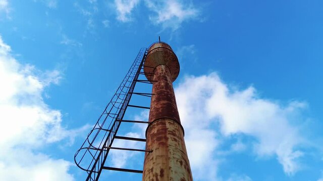 Old rusty soviet water tower