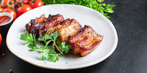 ribs grilled BBQ spices tomato sauce piece of meat second course snack ready to eat on the table meal snack top view copy space for text food background rustic