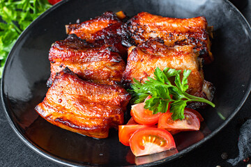 ribs grilled BBQ spices tomato sauce piece of meat second course snack ready to eat on the table meal snack top view copy space for text food background rustic
