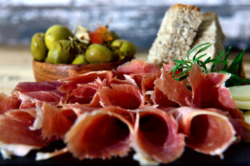 Spanish iberico serrano ham on a plater