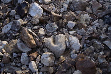 Various sizes and colors of rocks on the banks of the Missouri River