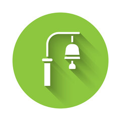 White Train station bell icon isolated with long shadow. Green circle button. Vector.