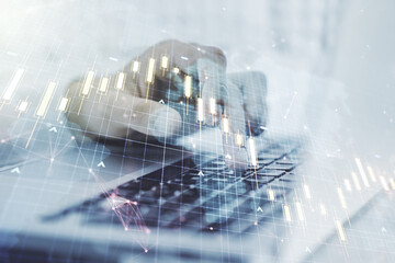 Multi exposure of abstract creative financial chart with world map and with hand typing on computer keyboard on background, research and analytics concept