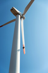 repair work on the blades of a windmill for electric power production - copy space