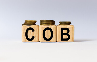 cubes with the word COB on them. Care concept.