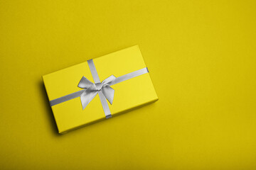 Yellow and gray Illuminating Christmas gift box