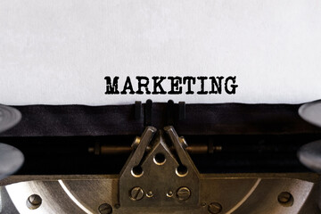 Vintage typewriter with typed text - MARKETING, on a sheet of paper
