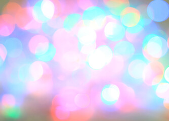 festive background of blurred colorful bright lights.