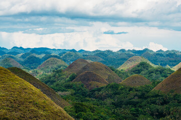 a valley with hills and trees