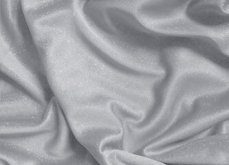 Shiny silver crumpled fabric texture background
