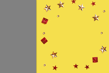 Color of the year 2021 yellow and gray with confetti in the different shapes. High quality photo