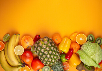 Fruit, citrus, vegetables with vitamin C, yellow background top view. Vitamin C natural sources for immunity stimulation, viruses and avitaminosis. Healthy food to boost immune system, copy space.
