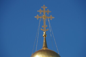 Orthodox Golden cross on the dome of the Church in Moscow, in the Novodevichy monastery on a Sunny...