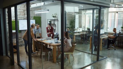 Diverse Group of Professional Businesspeople Meeting in the Conference Room. Stylish Busy Business Office with Creative People Working on App Design, Data Analysis, Plan Strategy for Social Media - Powered by Adobe