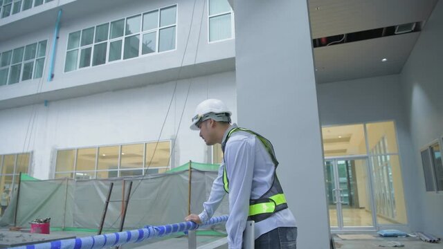 Engineer concept of 4k Resolution. Asian male employees are frustrated at work.